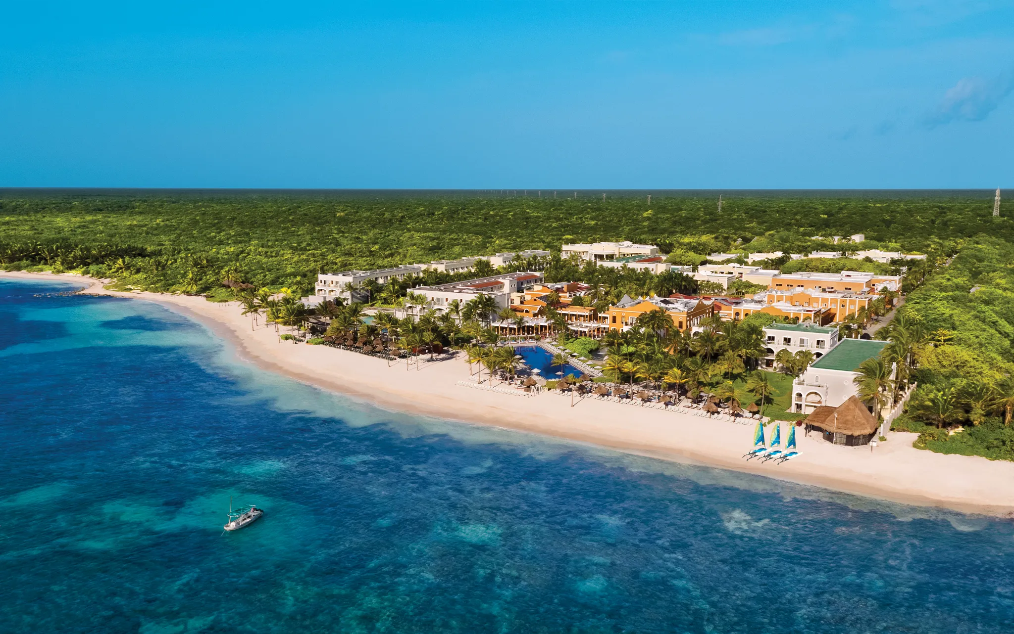 Aerial view of Dreams Tulum Resort & Spa along a pristine beachfront in Riviera Maya, Mexico.