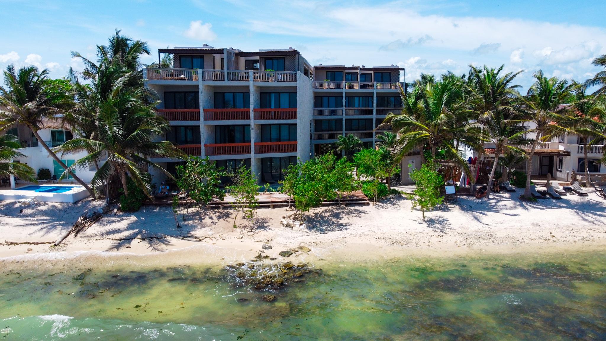 Alea Tulum Boutique Hotel modern beachfront property with infinity pool and Caribbean Sea views in Tulum, Mexico.