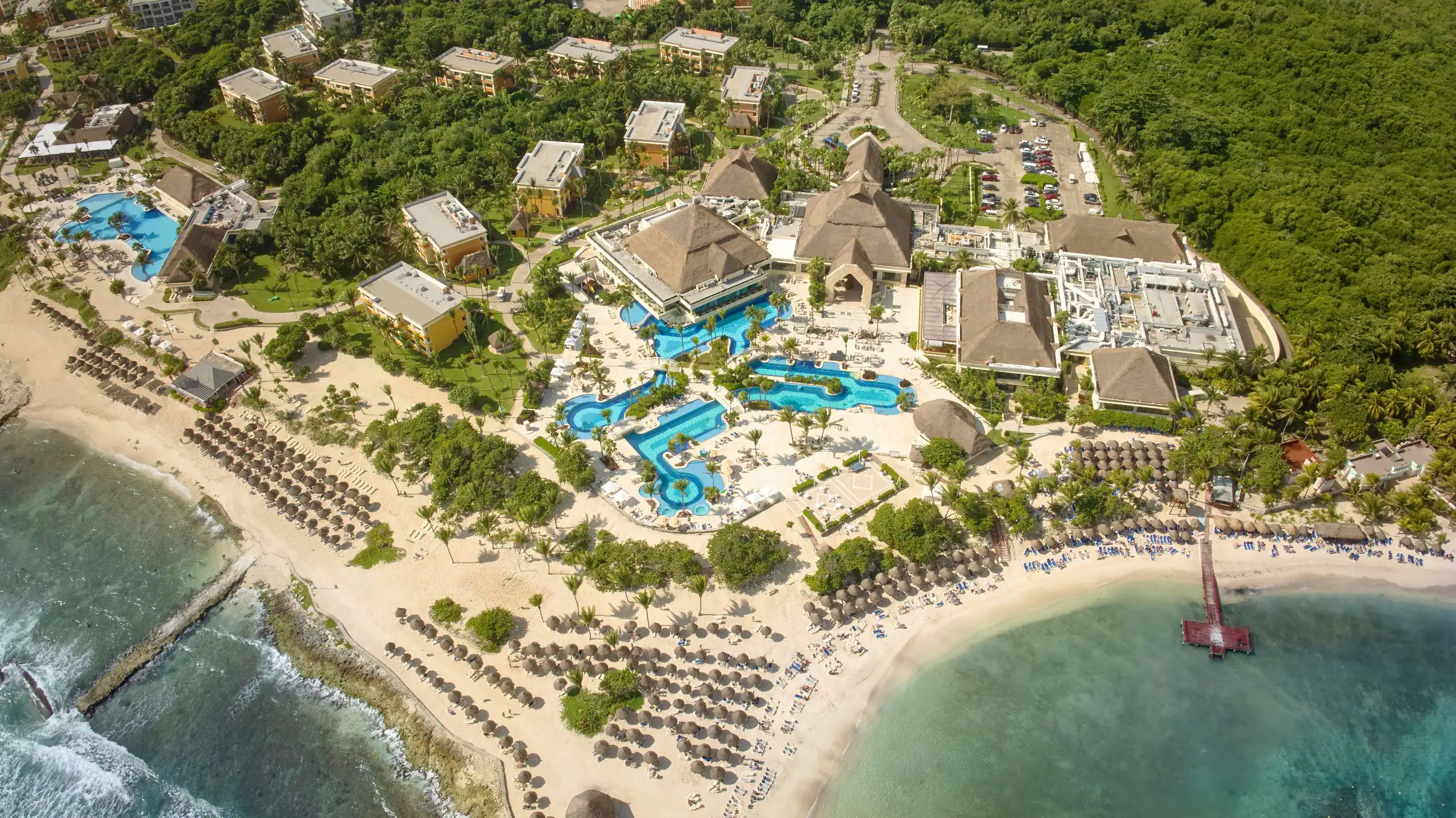 Bahia Principe Luxury Akumal all-inclusive beachfront resort with tropical landscaping and luxury amenities in Riviera Maya.