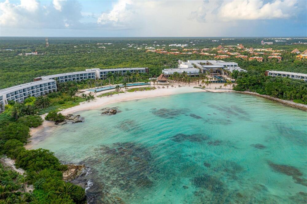 Conrad Tulum Riviera Maya luxury beachfront resort with modern architecture and oceanfront pools in Tulum, Mexico.