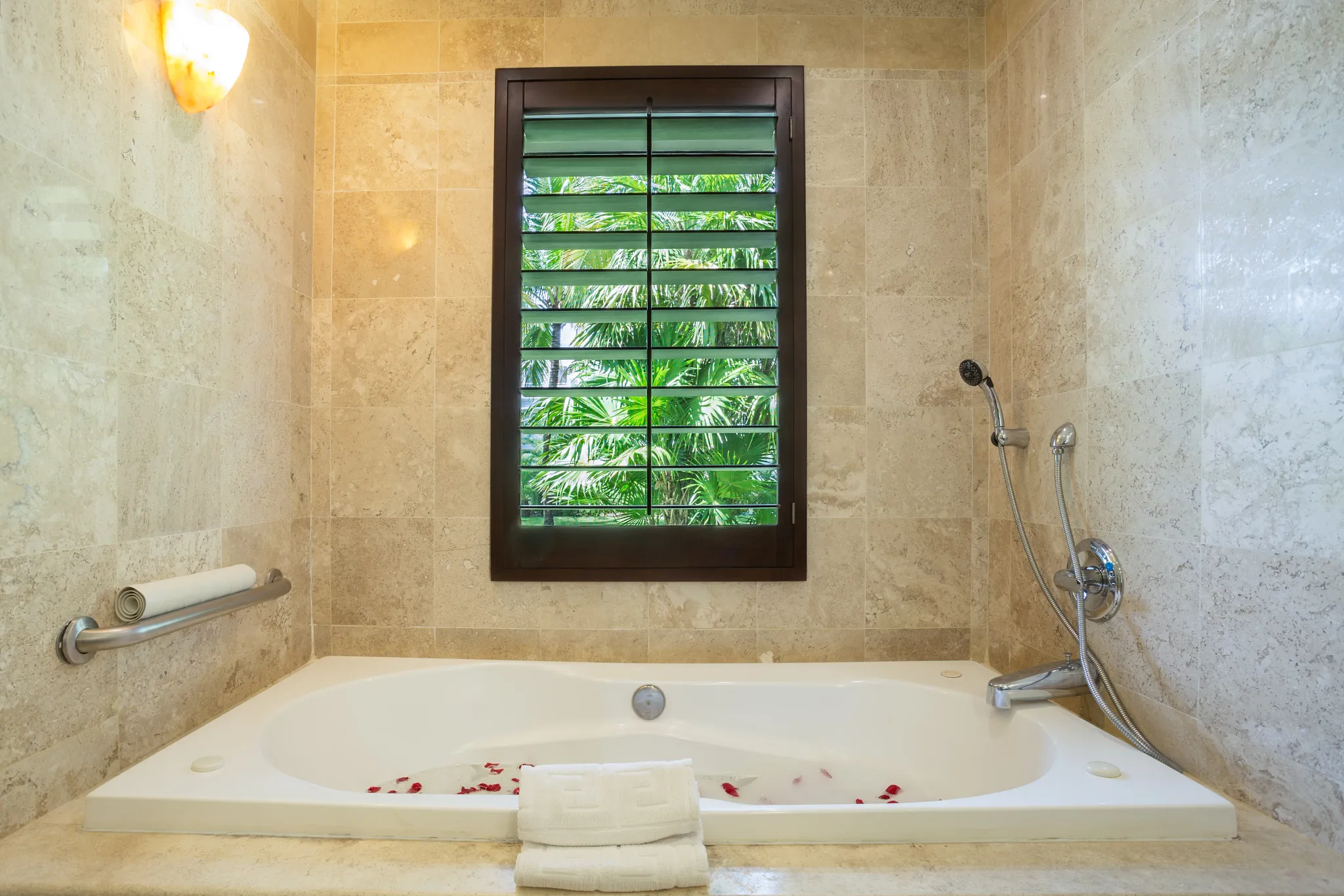 Deluxe Junior Garden View hot tub bathroom at Dreams Tulum Resort & Spa.