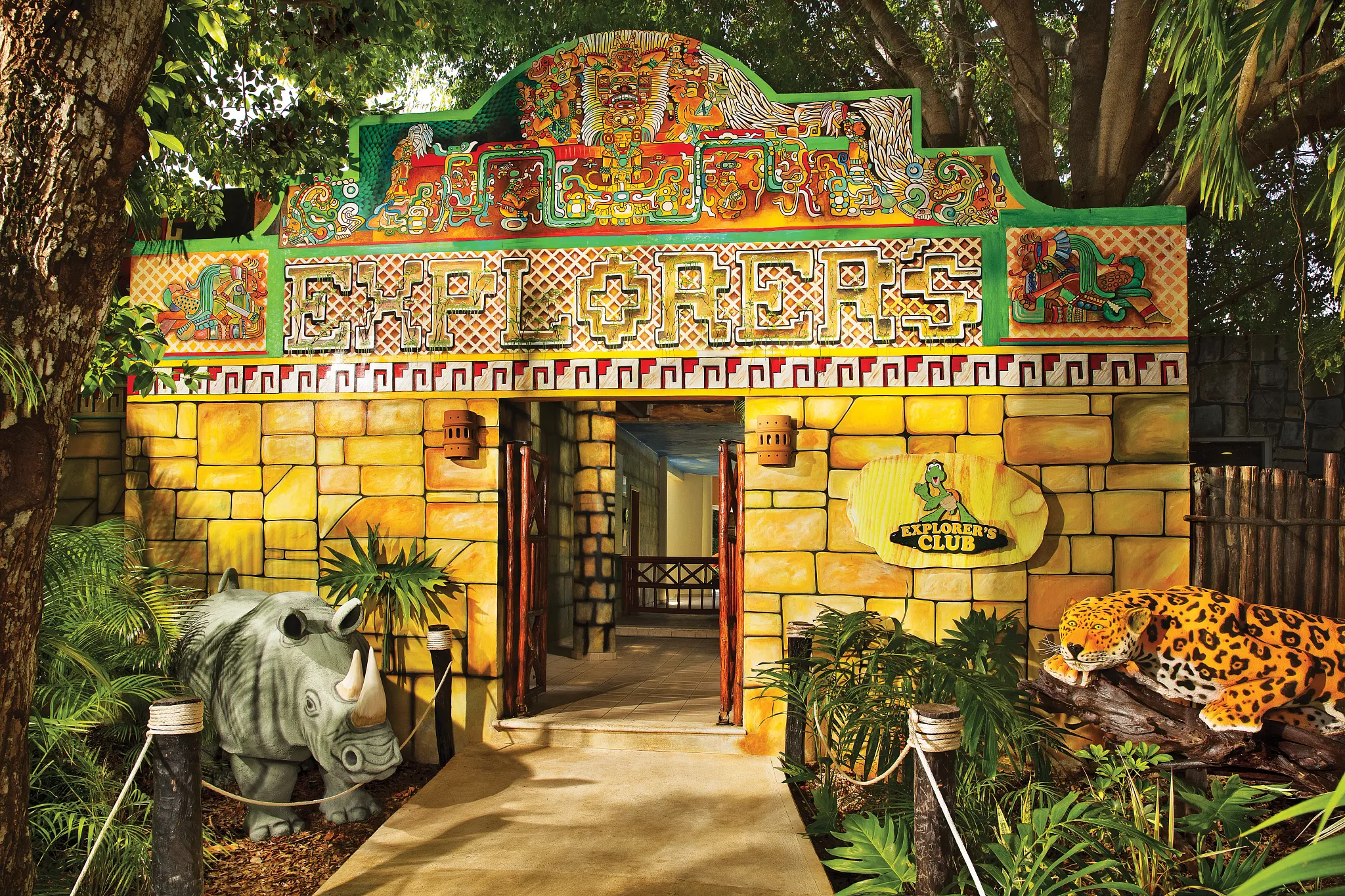 Entrance to the Explorer’s Club for Kids at Dreams Tulum Resort & Spa featuring colorful jungle-themed décor.
