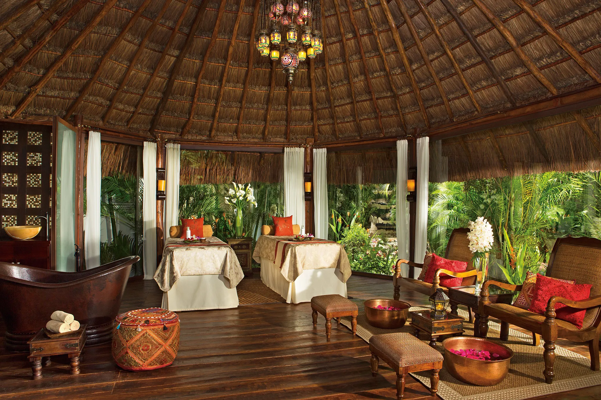 Luxurious holistic spa cabin surrounded by tropical gardens at Dreams Tulum Resort & Spa.
