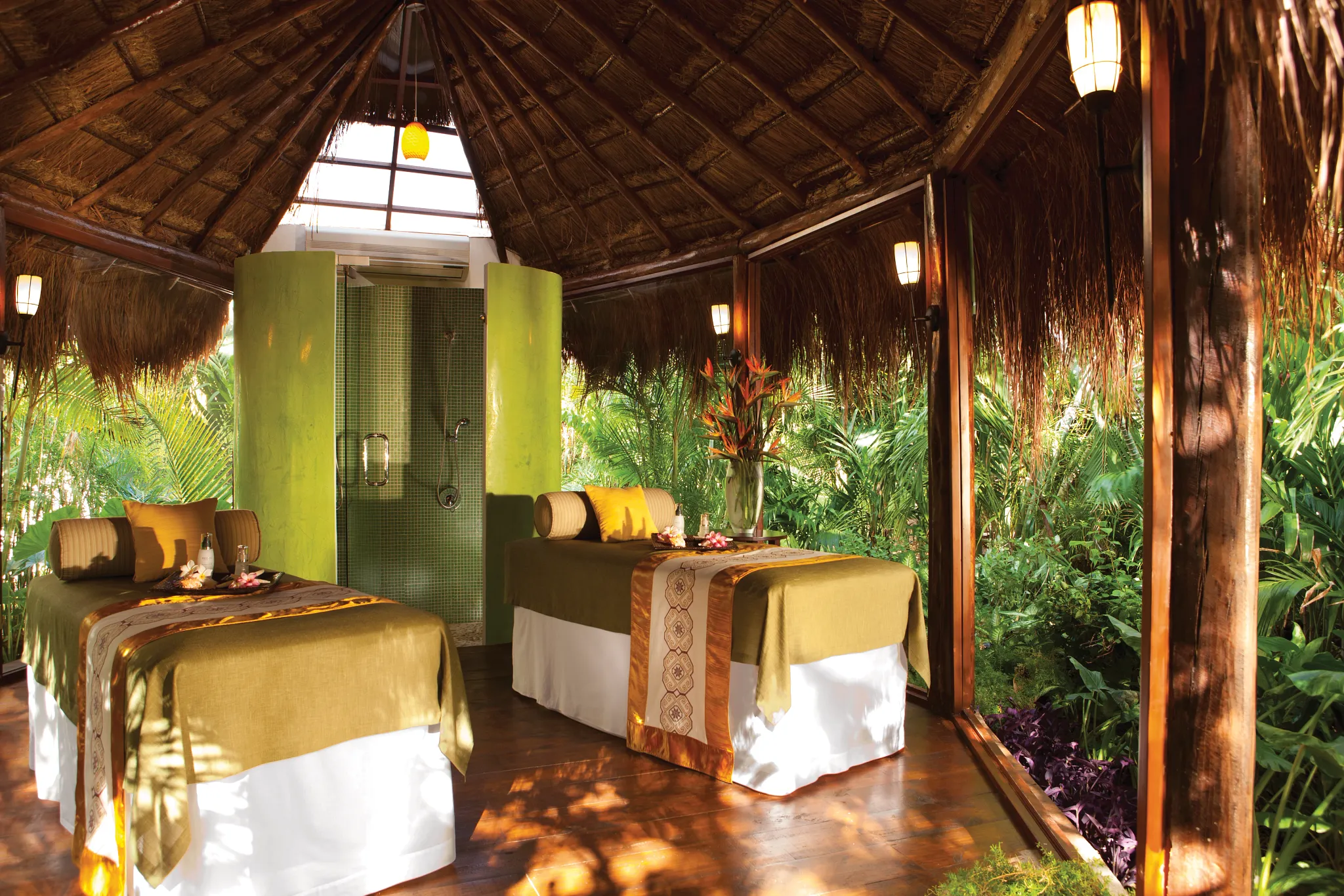 Private jungle spa treatment room immersed in lush tropical surroundings at Dreams Tulum Resort & Spa.