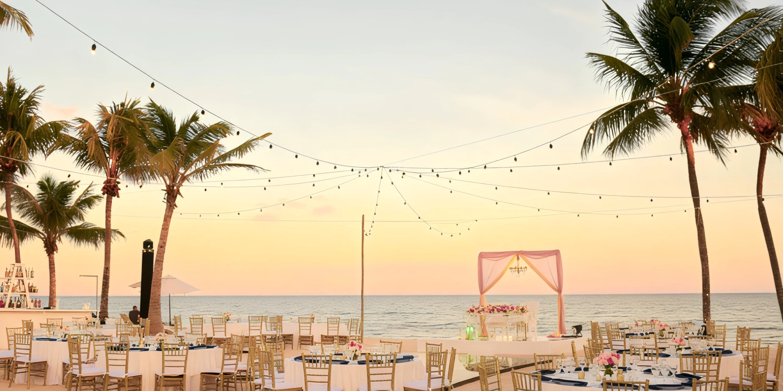 Preferred Beach wedding venue with oceanfront ceremony setup at Dreams Tulum Resort & Spa