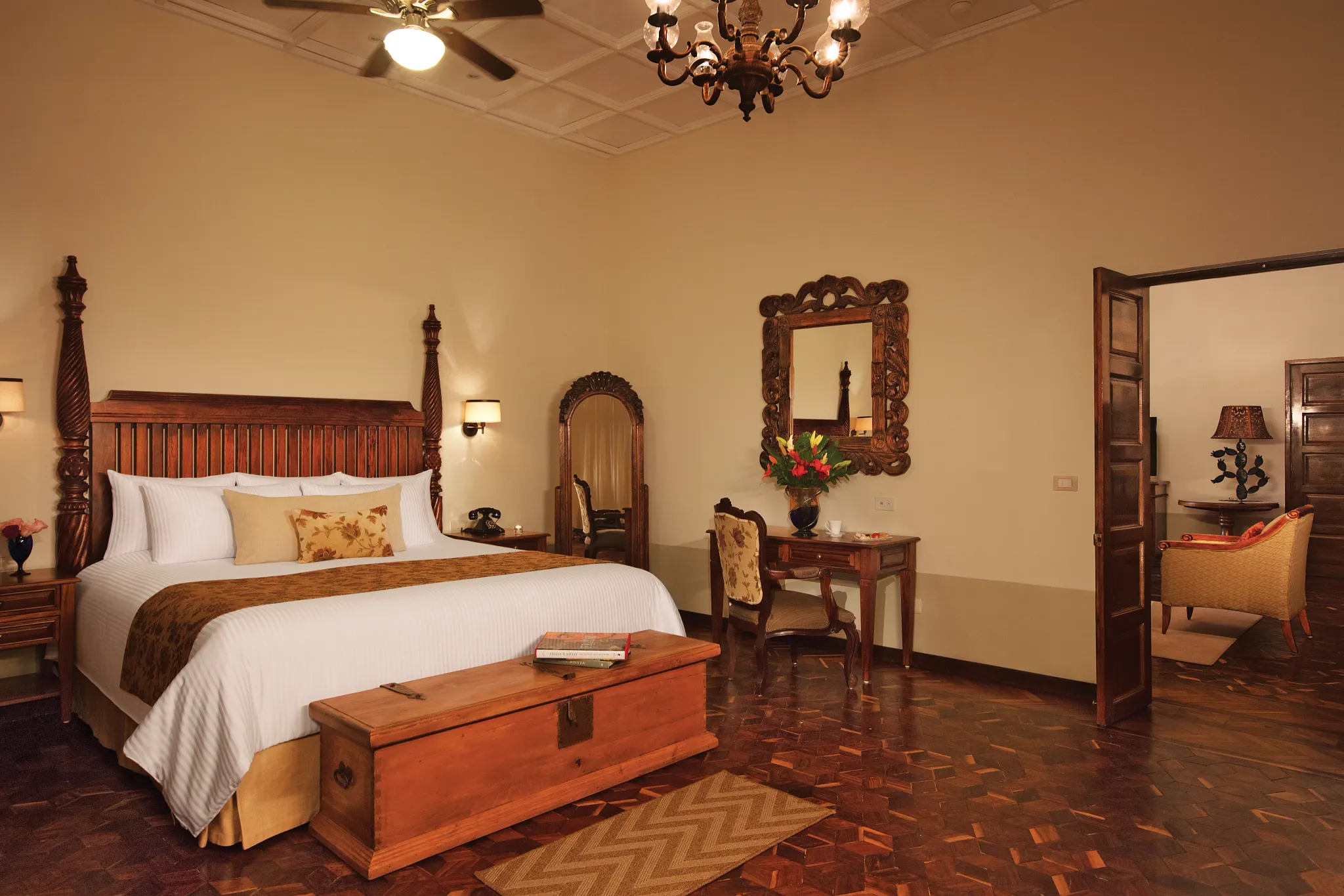 Preferred Club Hacienda Presidential Suite bedroom with king bed and elegant Mexican décor at Dreams Tulum Resort & Spa.