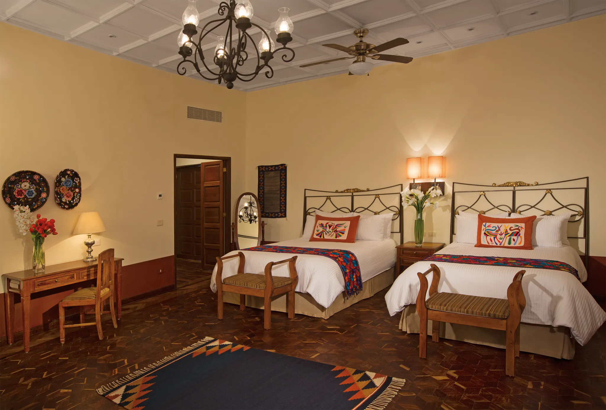 Preferred Club Hacienda Suite with two double beds, traditional Mexican décor, and spacious accommodations at Dreams Tulum Resort & Spa.