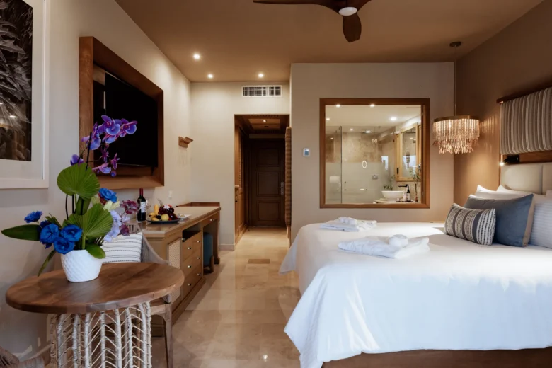 Preferred Club Ocean View king room with modern tropical décor at Dreams Tulum Resort & Spa.