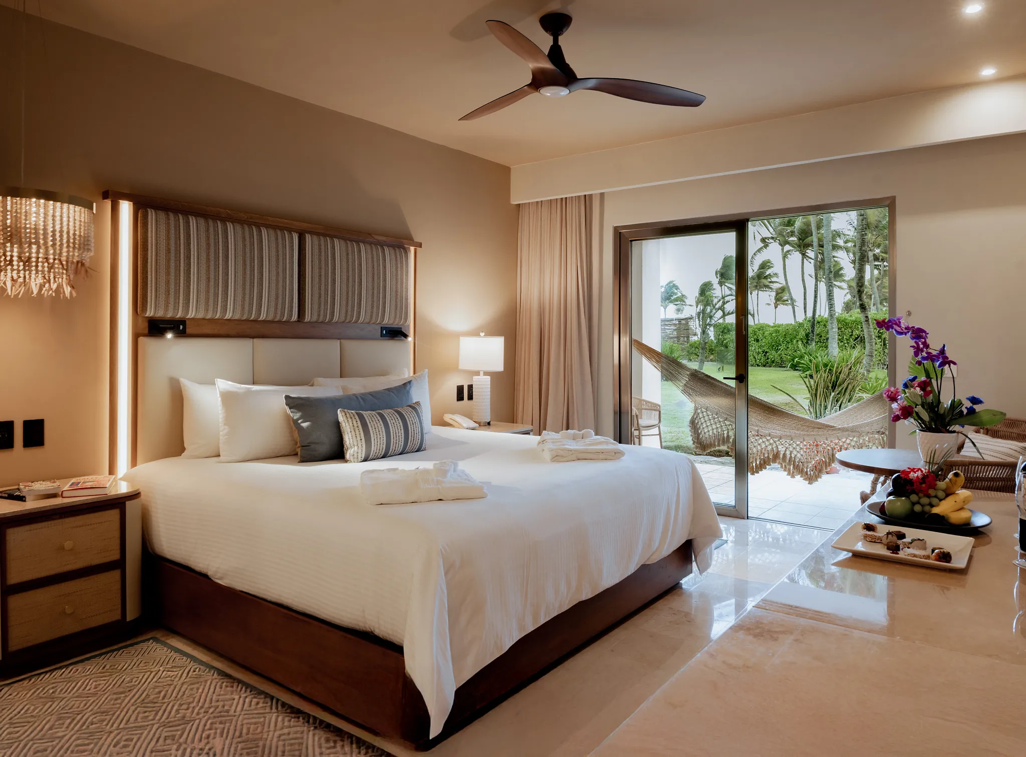Preferred Club Ocean View bedroom with king bed and luxury lighting at Dreams Tulum Resort & Spa.