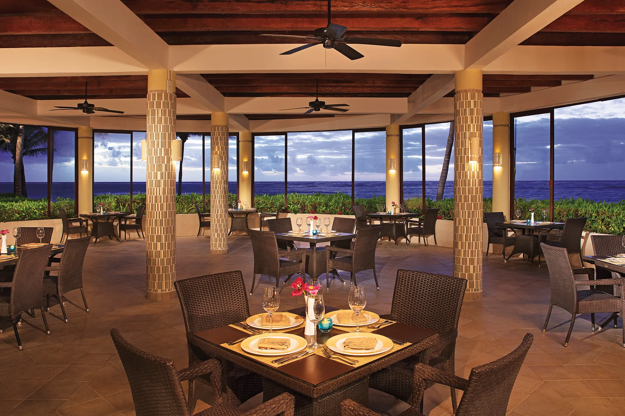 Seaside Grill at Dreams Tulum Resort & Spa featuring elegant oceanfront dining, grilled specialties, and panoramic Caribbean Sea views.