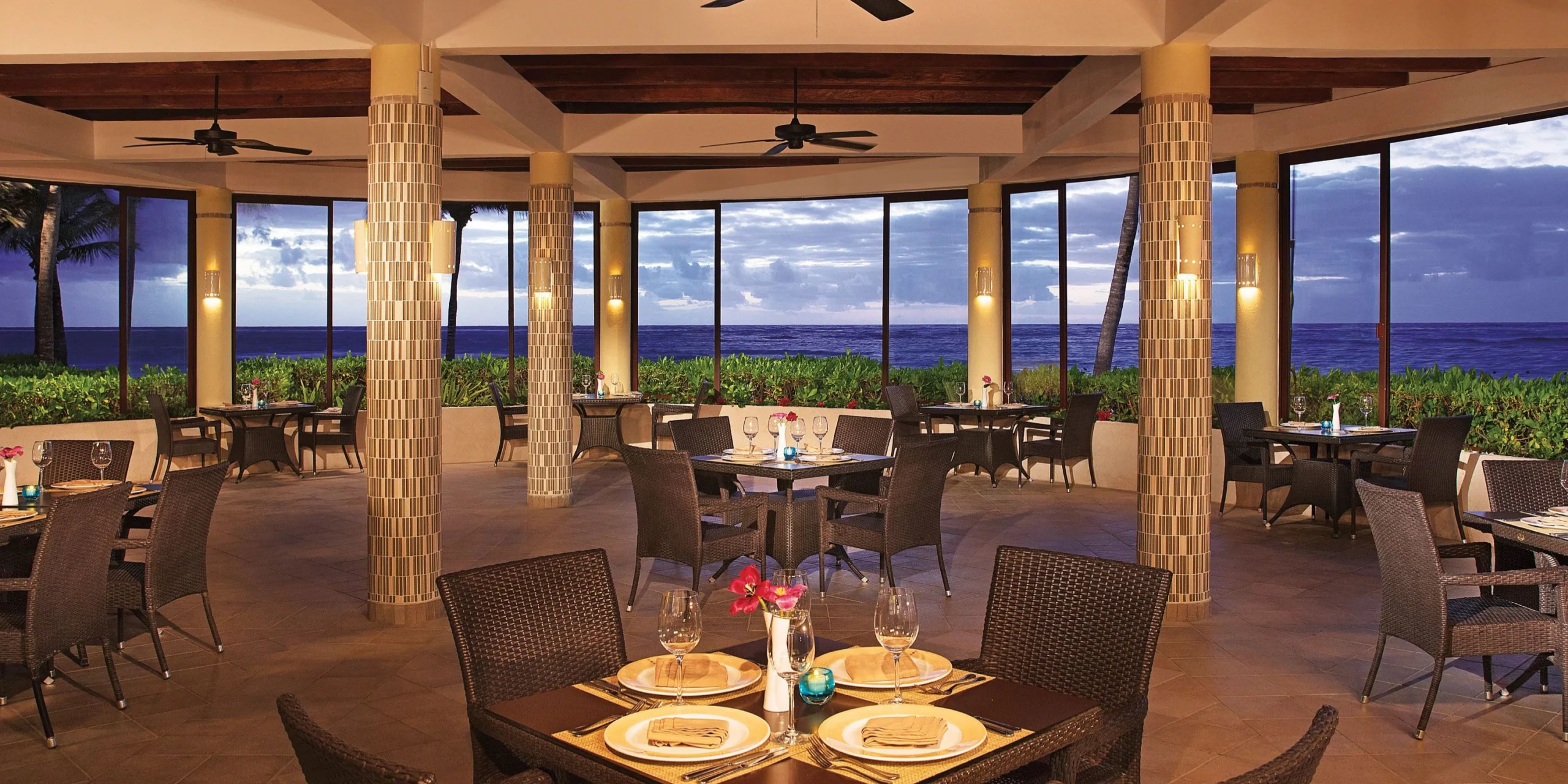 Seaside Grill Restaurant venue set for a wedding reception overlooking the beach at Dreams Tulum Resort & Spa