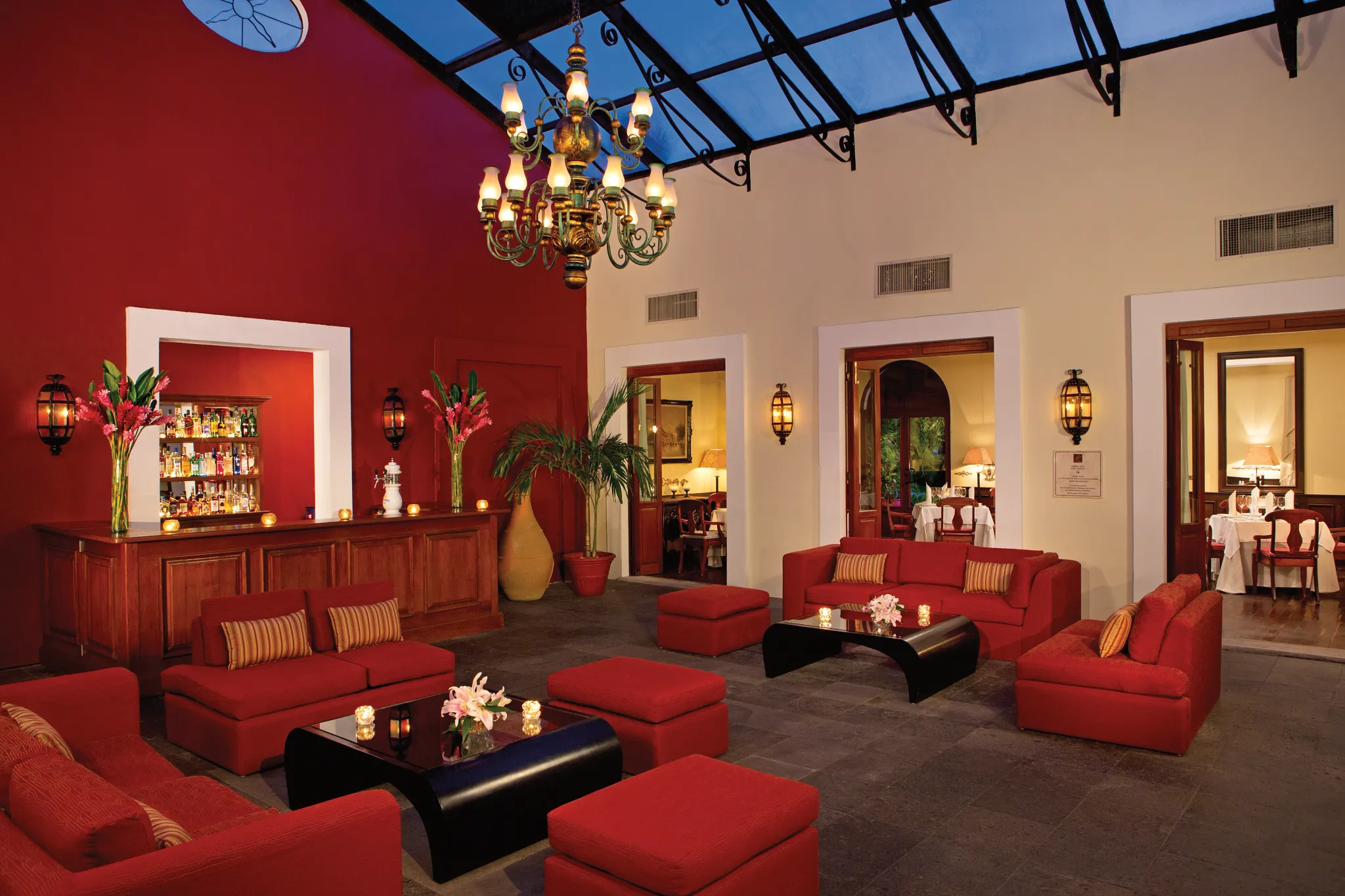 The Lounge at Dreams Tulum Resort & Spa featuring stylish indoor seating, handcrafted cocktails, and an inviting atmosphere for socializing and relaxation.